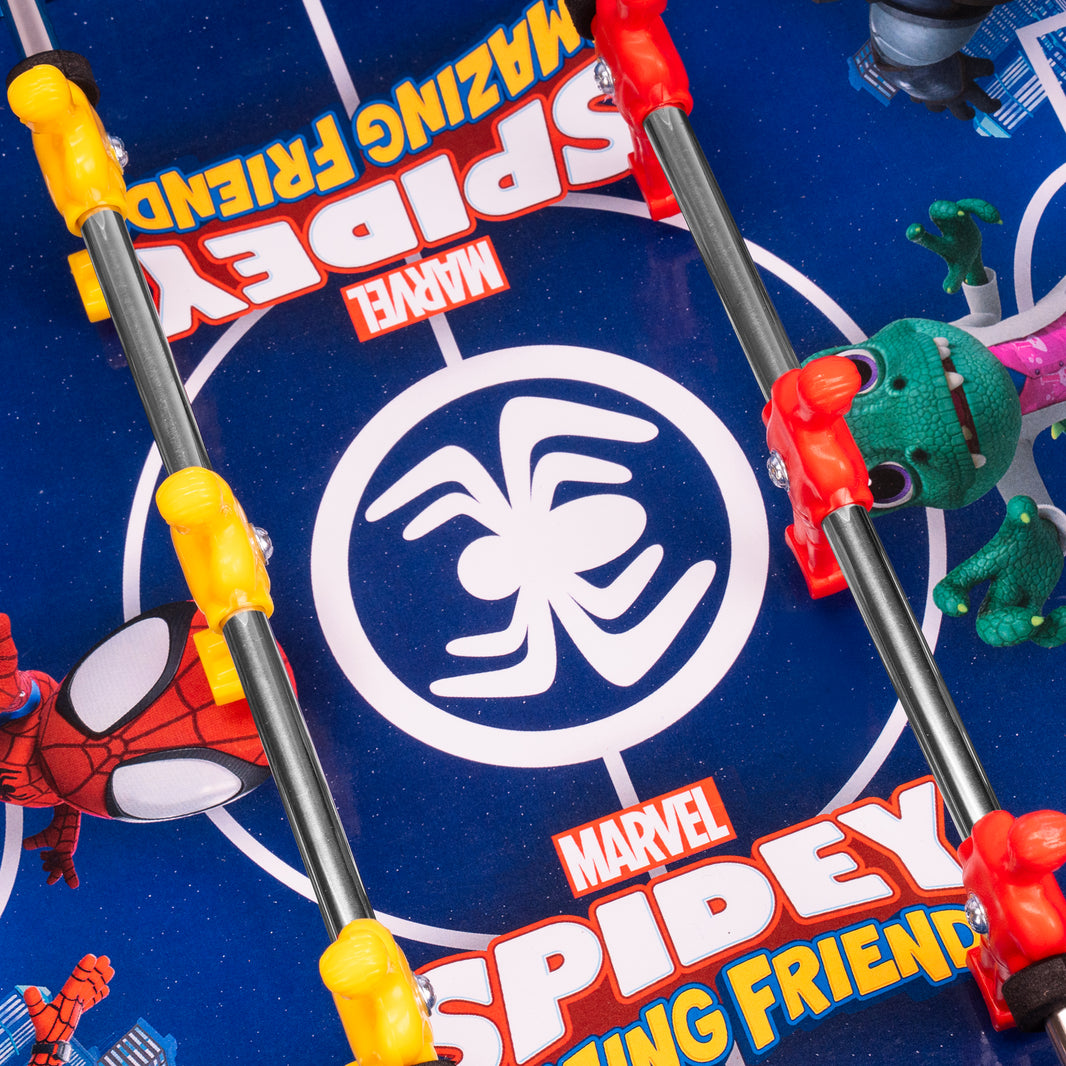 Toy figure of a spider-like character on a blue background with Marvel branding.