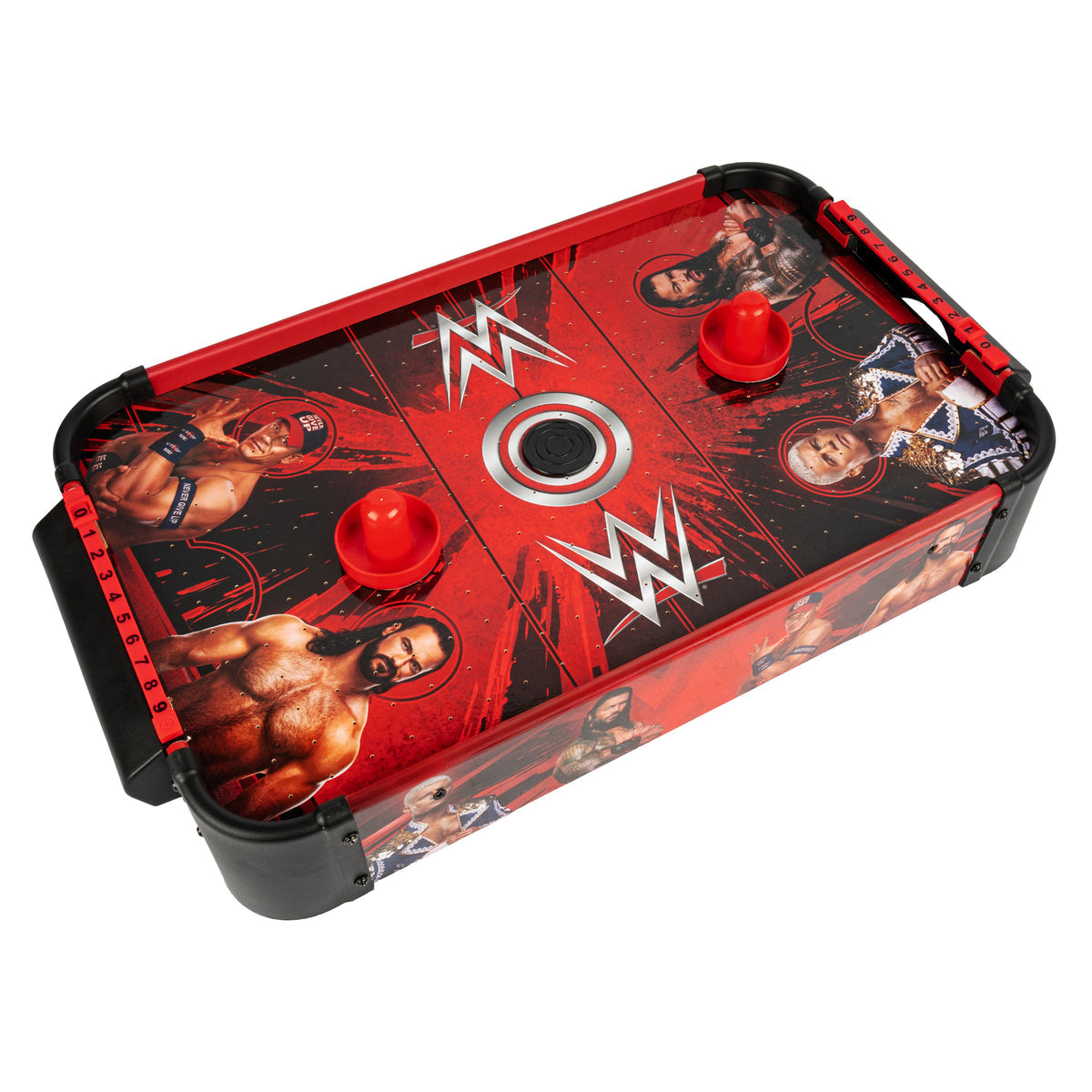 A WWE-themed air hockey table featuring red and black graphics with WWE logos and wrestler imagery, shown on a plain white background.